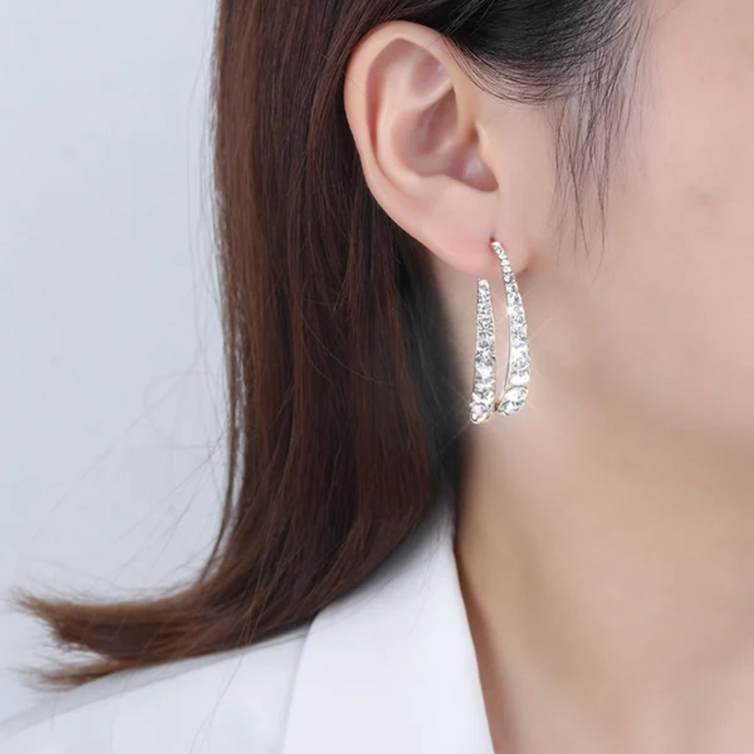 EarGlow™ – Opvallende statement oorring-boog [50% Korting]