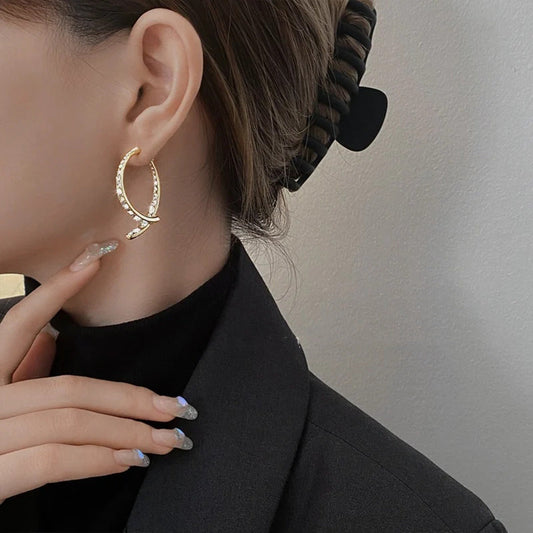 EarGlow™ – Opvallende statement oorring-boog [50% Korting]