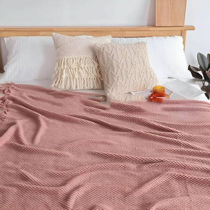 Gebreide fleecedeken met fleece binnenvulling – zacht en decoratief