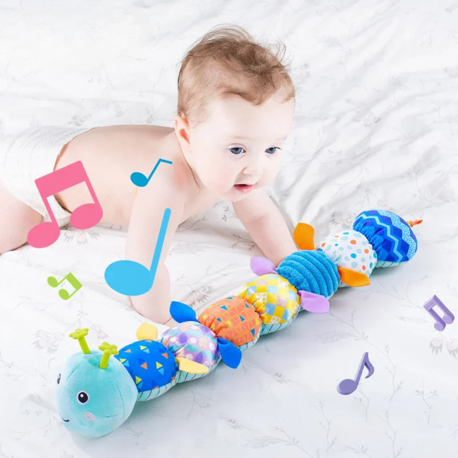 50% Korting | HappyPlush™ – Gevoelige pluche rammelaar en muzikale rups [Laatste dag korting]